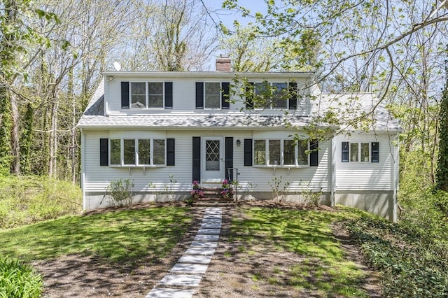 506 Woods Hole Rd, Falmouth, MA 02543 - view of front facade with entry steps, a chimney, and a shingled roof