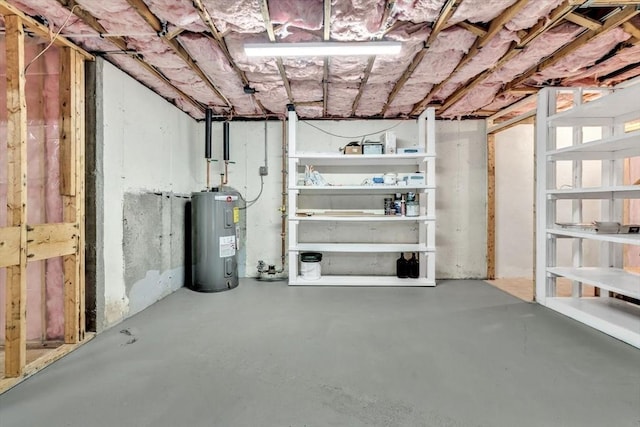 506 Woods Hole Rd, Falmouth, MA 02543 - unfinished below grade area featuring electric water heater