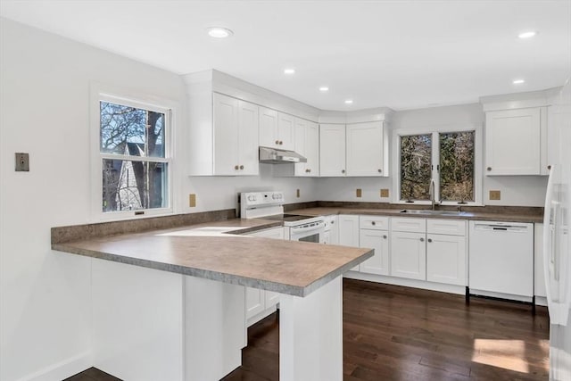 506 Woods Hole Rd, Falmouth, MA 02543 - kitchen featuring white appliances, under cabinet range hood, a sink, plenty of natural light, and recessed lighting