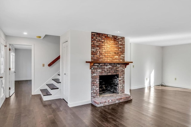 506 Woods Hole Rd, Falmouth, MA 02543 - unfurnished living room featuring wood finished floors, stairs, a fireplace, baseboards, and recessed lighting