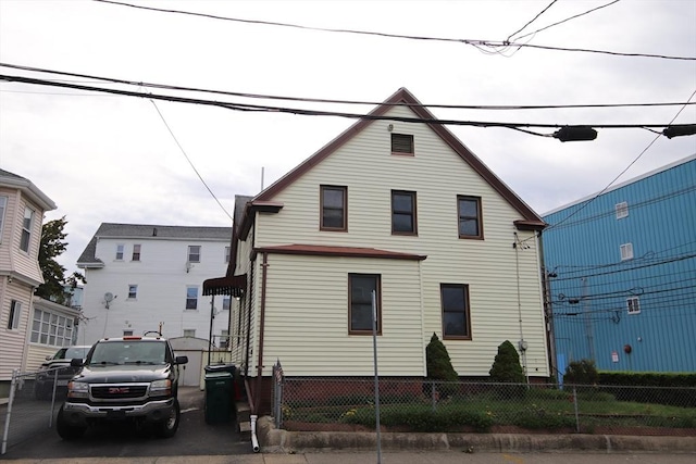view of front of house with fence