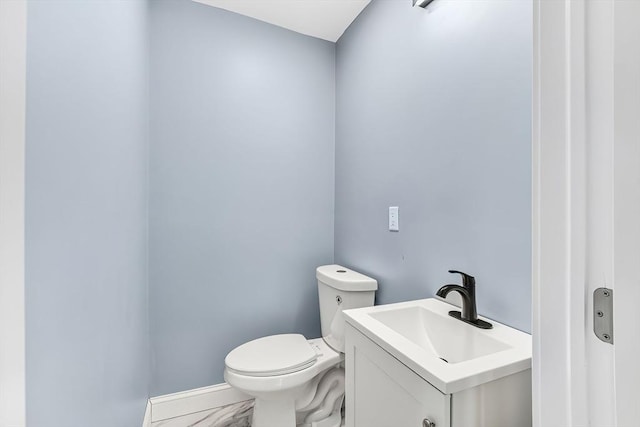 64 Clarkwood Unit 3, Boston, MA 02126 - bathroom featuring vanity and marble look tile flooring