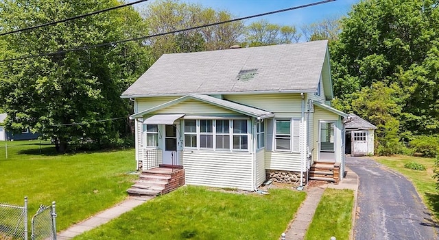 view of front of house with roof with shingles