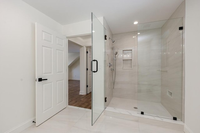 bathroom with an enclosed shower