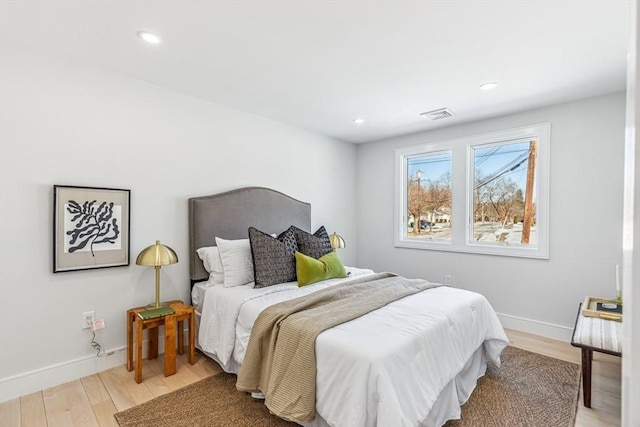 bedroom featuring light hardwood / wood-style flooring