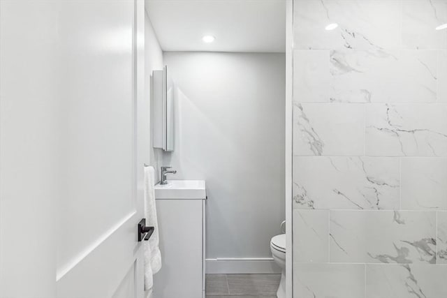 bathroom with vanity and toilet