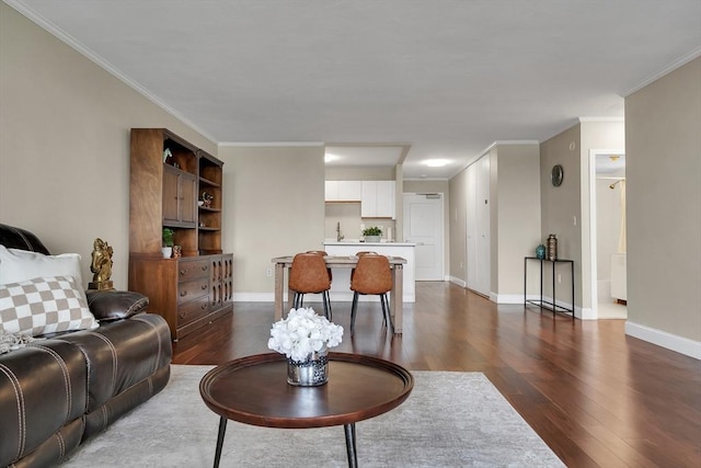 living room featuring crown molding and dark hardwood / wood-style floors