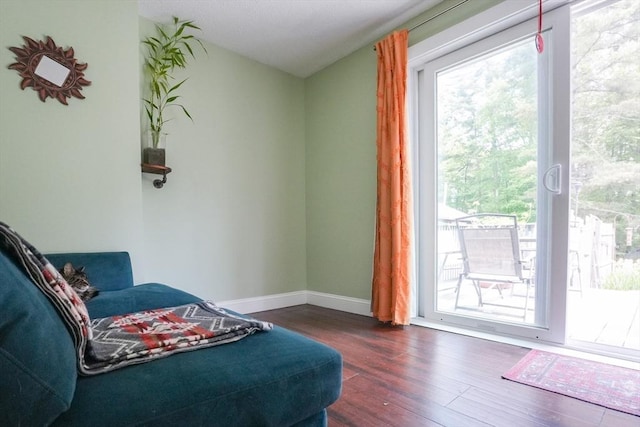 207 Belanger, Southampton, MA 01073 - living area with dark wood-type flooring and baseboards