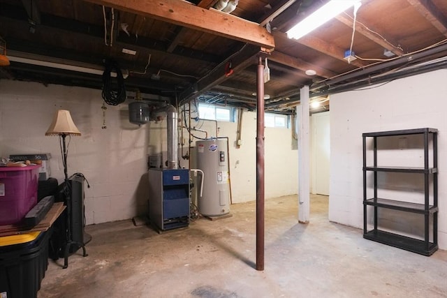 207 Belanger, Southampton, MA 01073 - basement featuring electric water heater and a heating unit