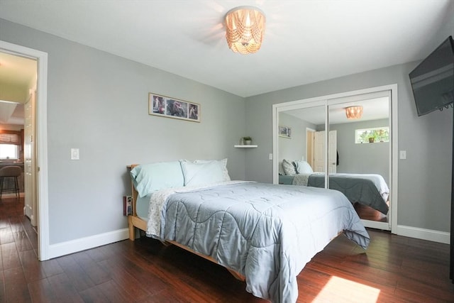 207 Belanger, Southampton, MA 01073 - bedroom featuring baseboards, wood finished floors, and a closet