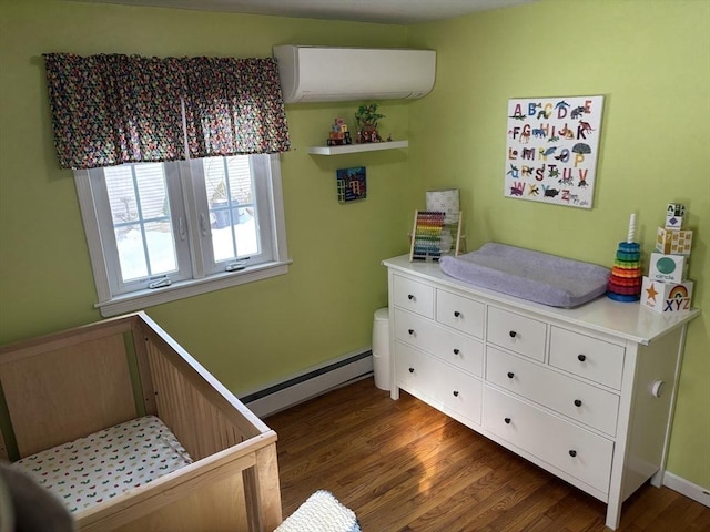 bedroom with dark wood-style floors, a wall unit AC, and baseboard heating