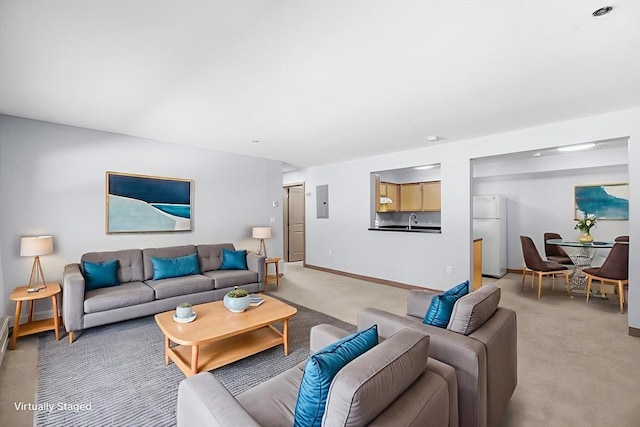 275 W Main St Unit 21, Marlborough, MA 01752 - living area with light colored carpet, baseboards, and electric panel
