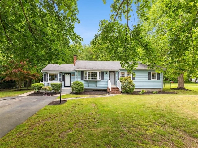 2025 S St, Bridgewater, MA 02324 - single story home with a chimney and asphalt driveway