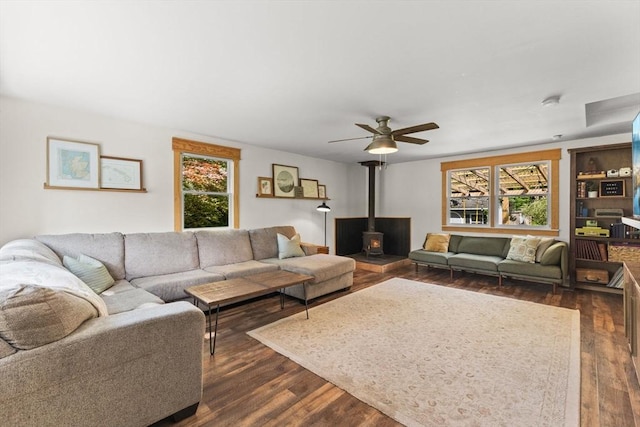 2025 S St, Bridgewater, MA 02324 - living room with a wood stove, dark wood finished floors, and a ceiling fan