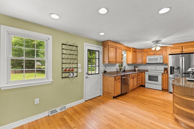 2025 S St, Bridgewater, MA 02324 - kitchen with appliances with stainless steel finishes, baseboards, a sink, plenty of natural light, and recessed lighting