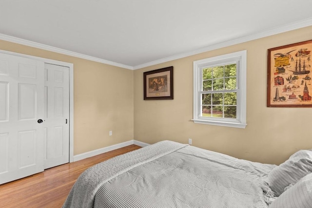2025 S St, Bridgewater, MA 02324 - bedroom with wood finished floors, baseboards, and crown molding
