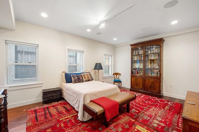 bedroom featuring hardwood / wood-style floors