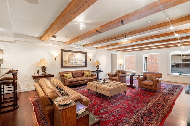 living room featuring beam ceiling and hardwood / wood-style floors