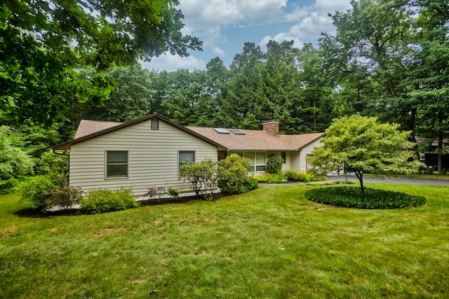 view of front of house with a front yard