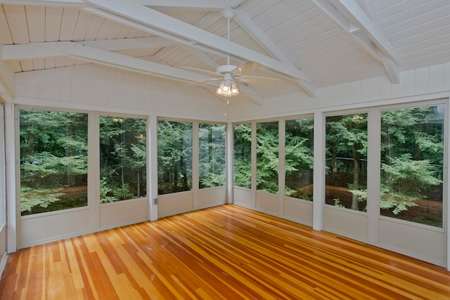 unfurnished sunroom featuring vaulted ceiling with beams and ceiling fan