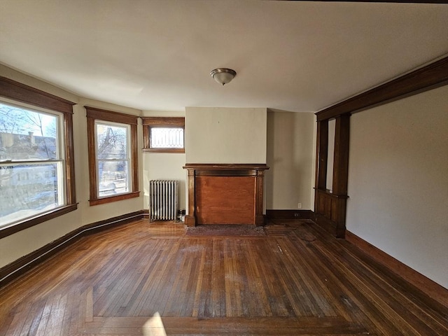 unfurnished living room with radiator