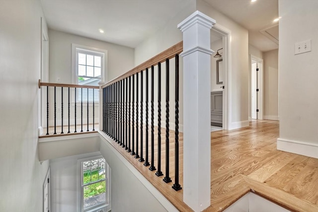 46 Pearl St, Melrose, MA 02176 - stairway with wood finished floors and recessed lighting