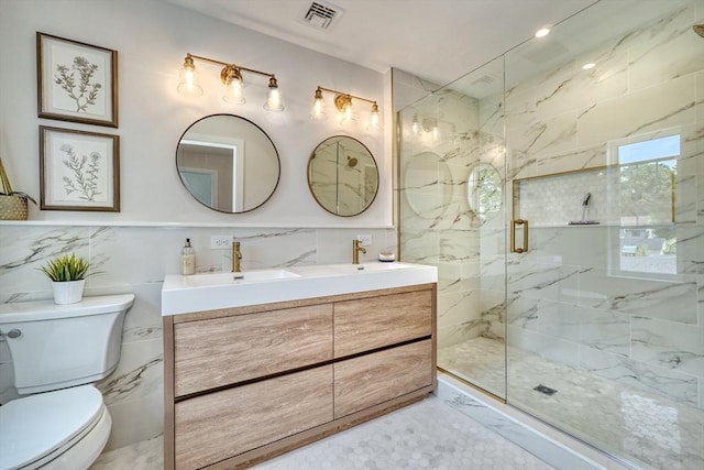 46 Pearl St, Melrose, MA 02176 - full bath featuring tile walls, double vanity, and a marble finish shower