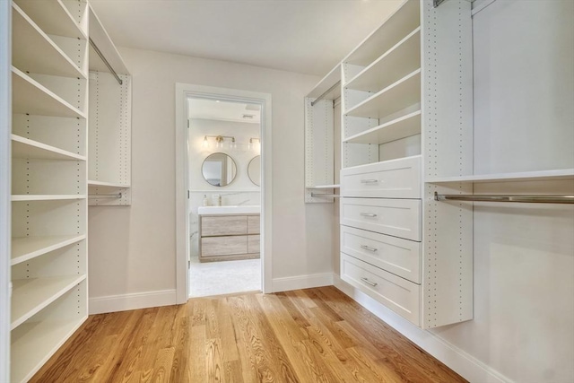 46 Pearl St, Melrose, MA 02176 - spacious closet with light wood-style floors