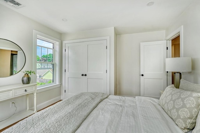 46 Pearl St, Melrose, MA 02176 - bedroom featuring a closet and wood finished floors