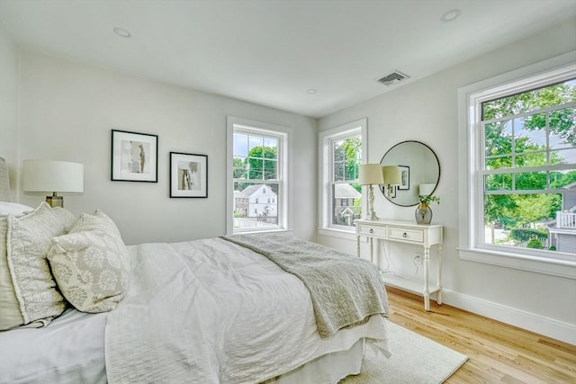 46 Pearl St, Melrose, MA 02176 - bedroom featuring light wood-style floors and baseboards