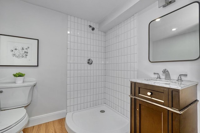 46 Pearl St, Melrose, MA 02176 - full bath with a tile shower, vanity, and wood finished floors