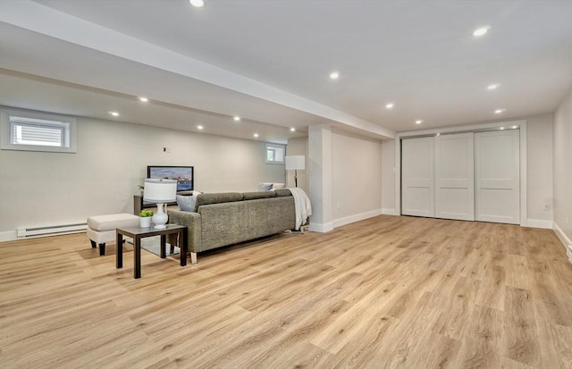 46 Pearl St, Melrose, MA 02176 - living room with baseboard heating, light wood-type flooring, and recessed lighting