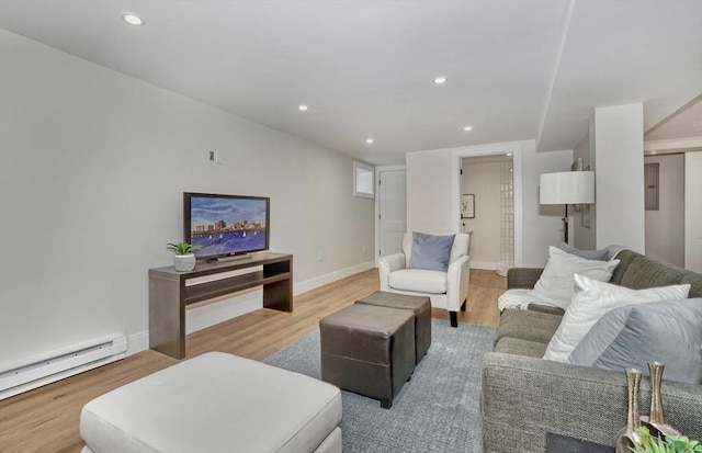 46 Pearl St, Melrose, MA 02176 - living area with wood finished floors, baseboard heating, and recessed lighting