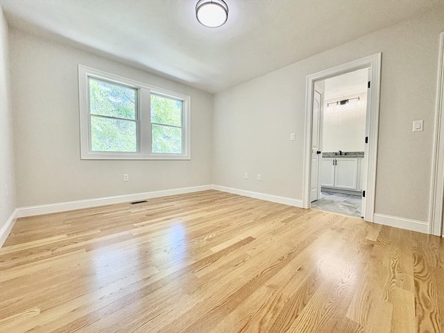 27 Pond Lane Ext, Billerica, MA 01821 - spare room featuring light wood-style flooring and baseboards