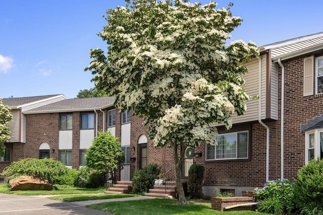 399 Pond St Unit G6, Braintree, MA 02184 - view of property with brick siding