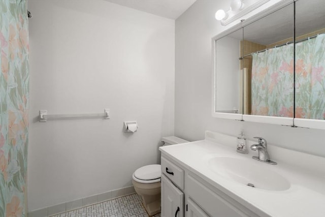 399 Pond St Unit G6, Braintree, MA 02184 - bathroom with vanity and tile patterned floors