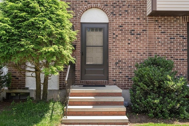 399 Pond St Unit G6, Braintree, MA 02184 - view of exterior entry featuring brick siding