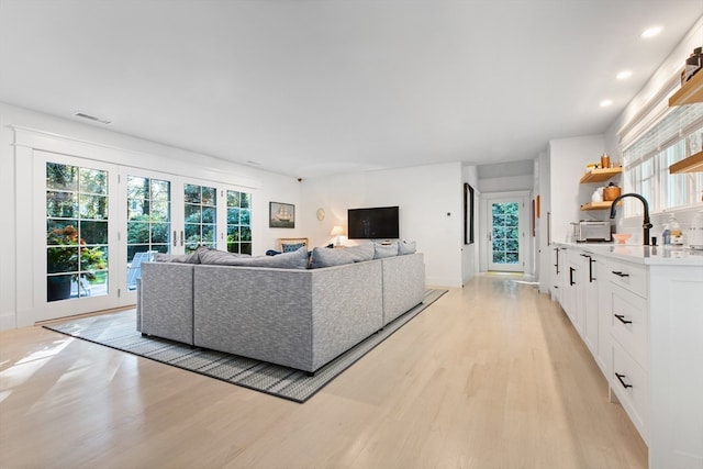 living room with light wood-type flooring