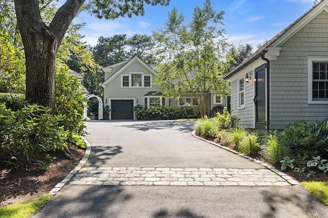 front of property featuring a garage