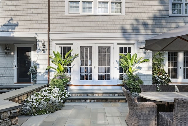 doorway to property featuring french doors