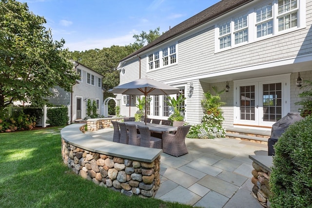 view of patio / terrace featuring french doors