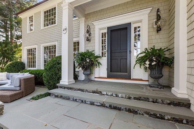 entrance to property with covered porch