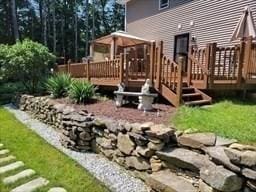 view of yard with a wooden deck