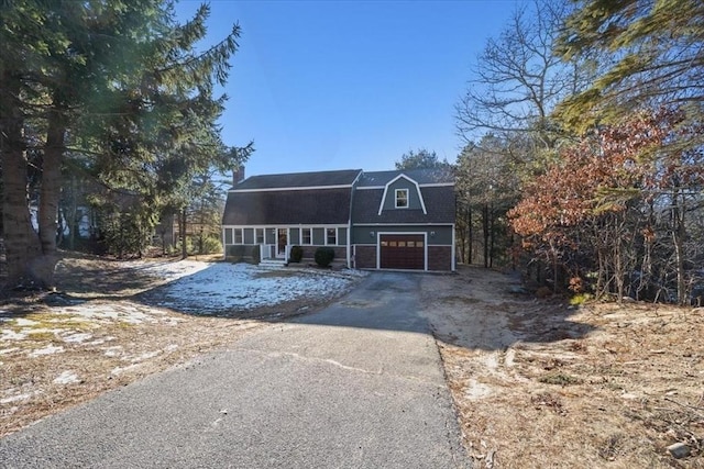 front facade with a garage