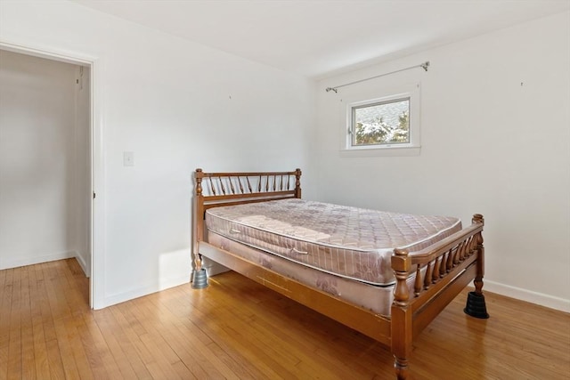 bedroom featuring hardwood / wood-style flooring