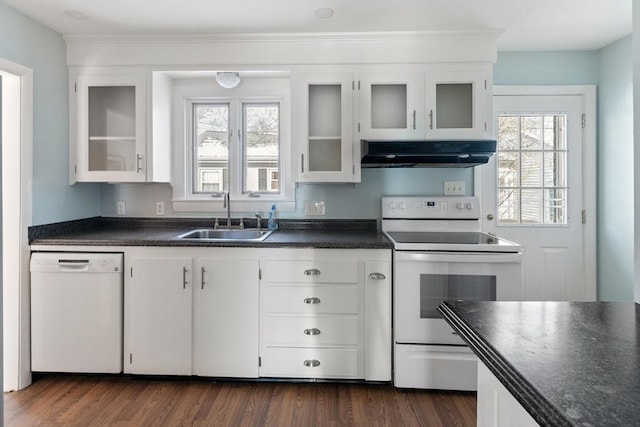 kitchen with sink, white cabinetry, exhaust hood, and white appliances