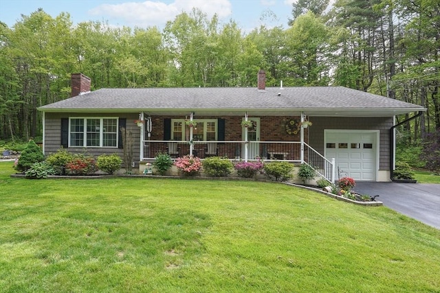 14 Daniels Rd, Charlton, MA 01507 - ranch-style house featuring a chimney, a porch, an attached garage, driveway, and a front lawn