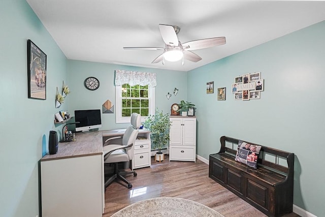 14 Daniels Rd, Charlton, MA 01507 - home office featuring a ceiling fan, wood finished floors, baseboards, and baseboard heating