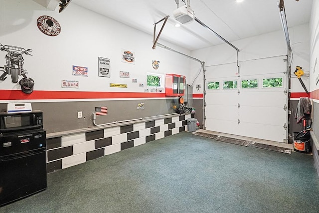 14 Daniels Rd, Charlton, MA 01507 - garage featuring a garage door opener