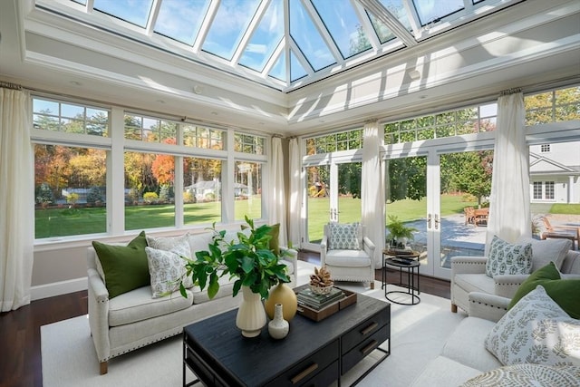 210 Monument Farm Rd, Concord, MA 01742 - sunroom featuring french doors, crown molding, a skylight, and wood finished floors